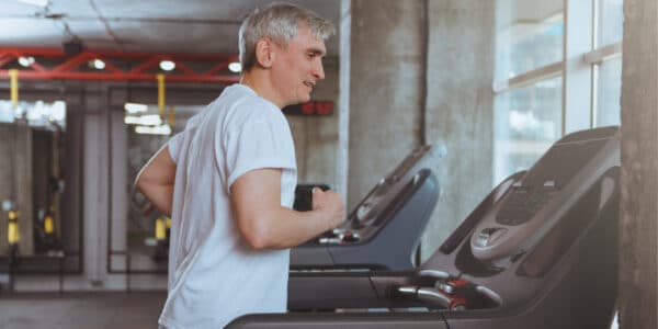 Men jogging on the treadmills