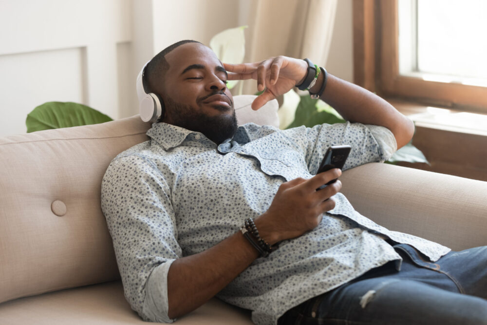 man listening to mindfulness meditation app